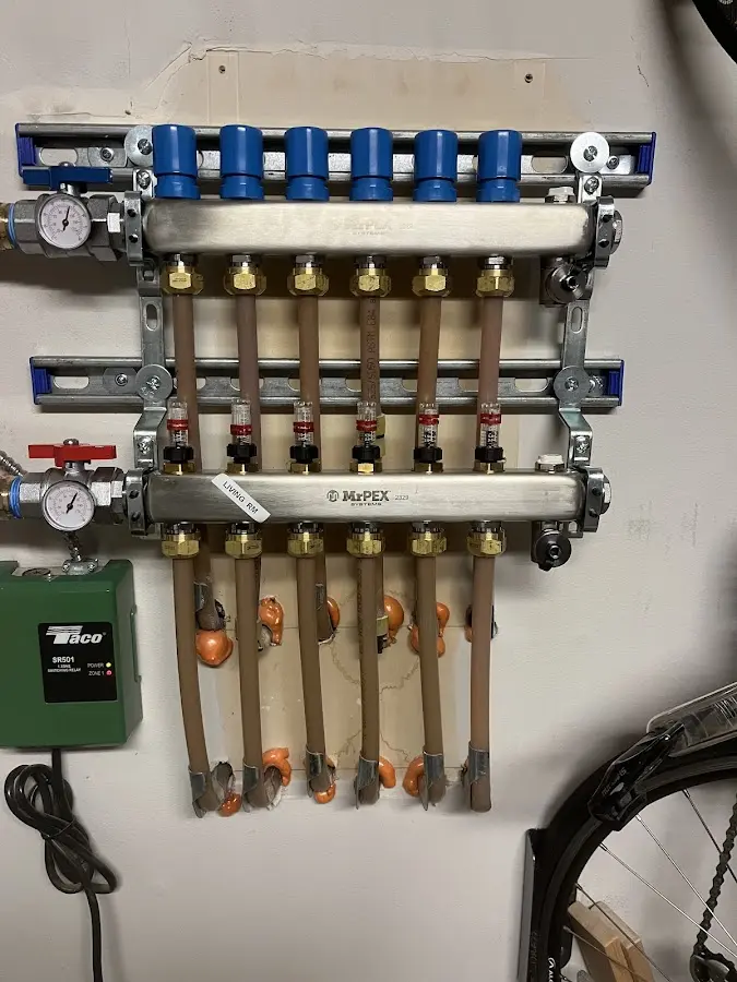 Plumber performing Water Heater Repair at a residential property in Wilmette